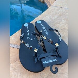 Karl Lagerfeld Black Flip Flop Sandals with Gold & Silver Accents